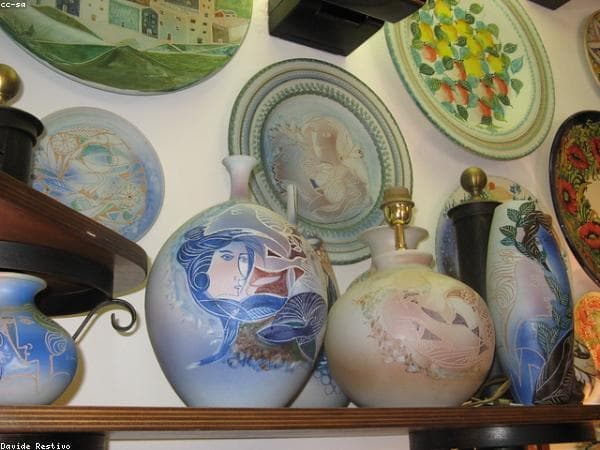 Ceramic vases under defect inspection at QC bench 2